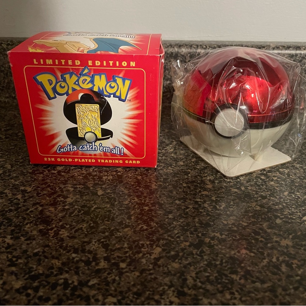 Pokémon gold platted poke ball with authenticity card - unopened